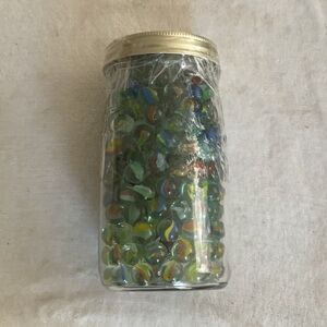 Colorful vintage Glass Marbles in Jar
